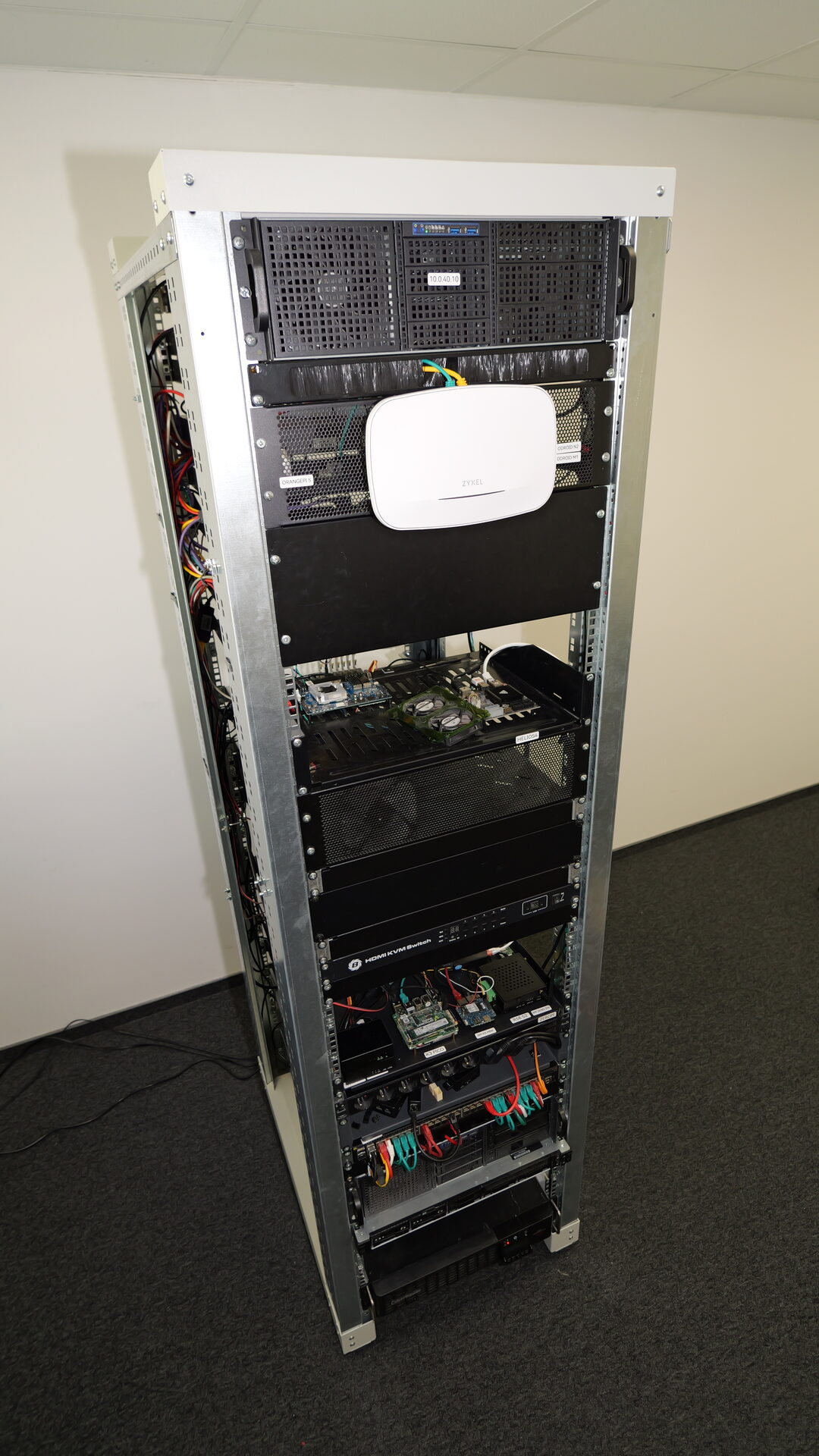 Full rack front: build server, HDMI KVM switch, boards and switches