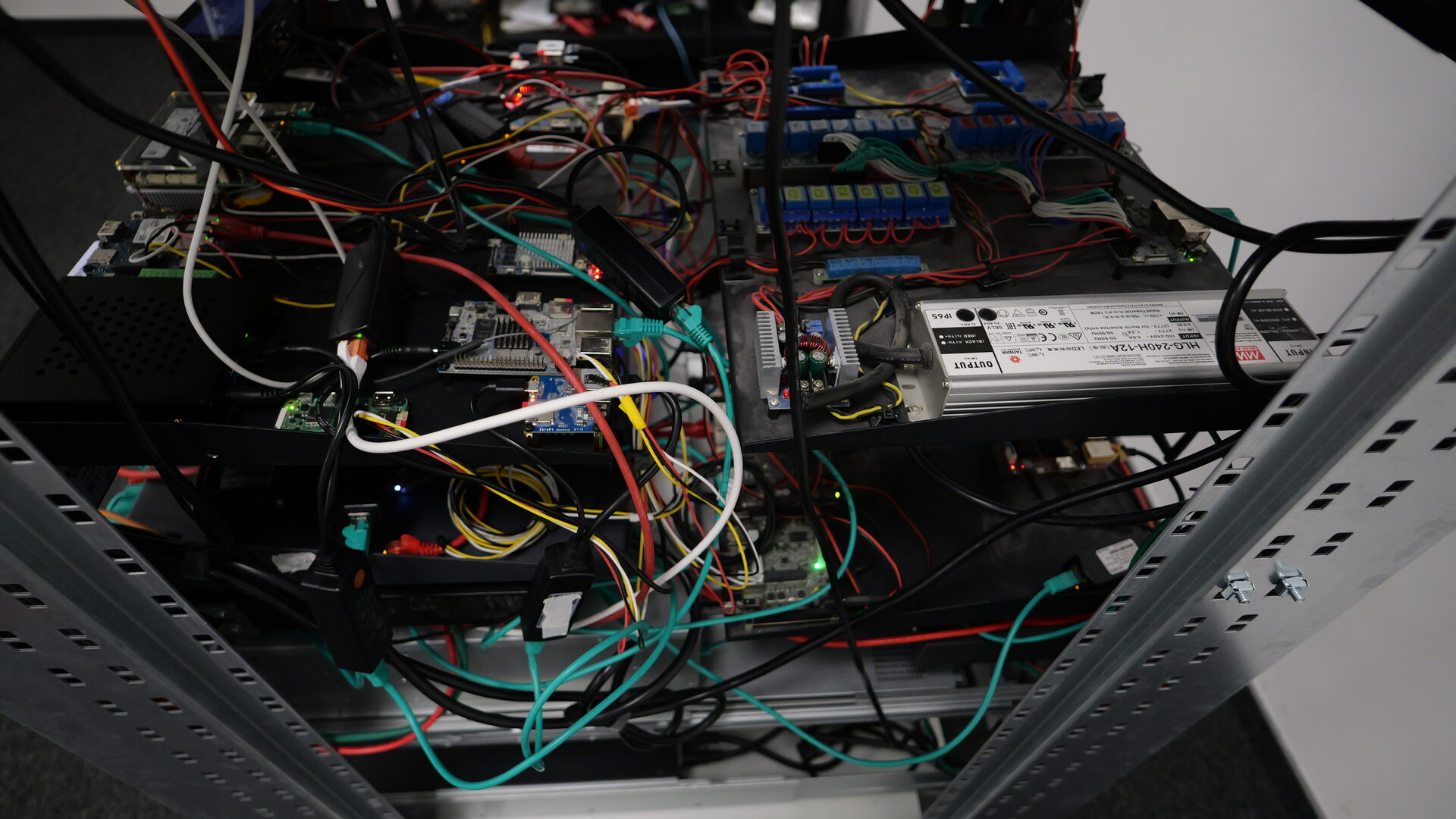 Top-down view of the control wiring: relay boards and a Meanwell PSU
